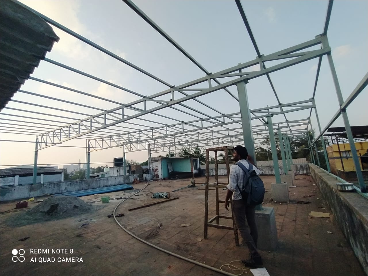 MS structural steel roofing framework fabrication in progress by Arasuvel Roofings for industrial building