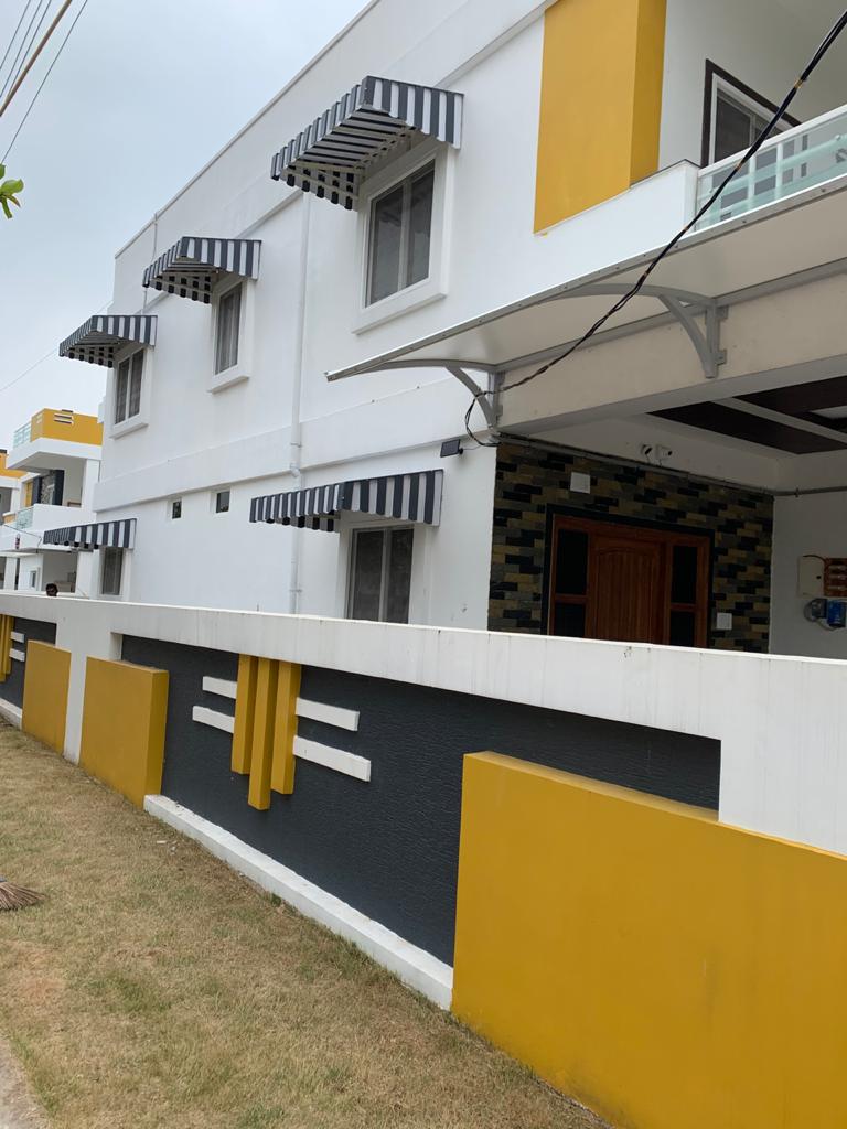 Modern aluminium window awnings installed by Arasuvel Roofings for residential house exterior protection